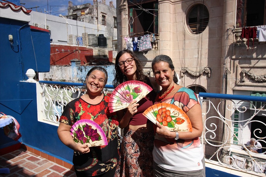 'Wooden fans that Mabel (left) makes.' 